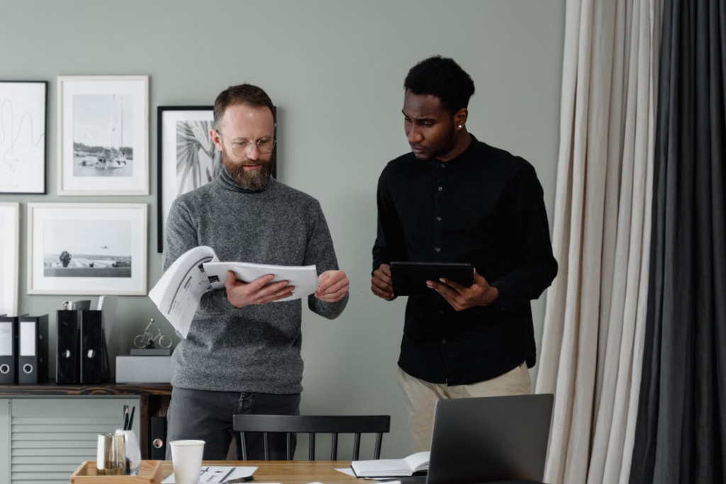 Accountant discussing payroll and business finances with a business owner